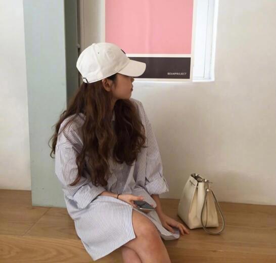 喜欢这种慵懒感的hair style美女街拍图片